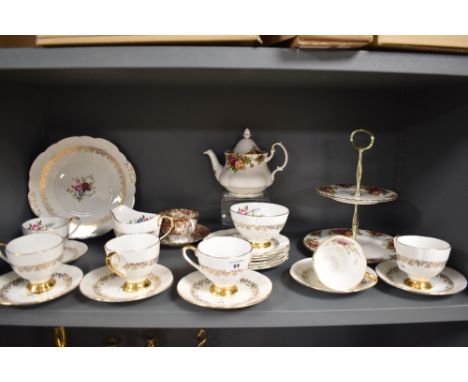 An assorted collection of Taylor &amp; Kent and Royal Albert china tea ware, to include a cake stand in the Old Country Roses