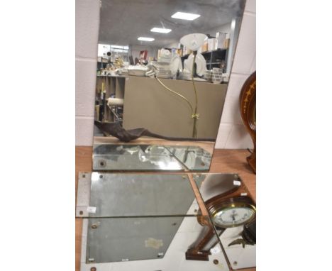 Four vintage British rail mirrors, three having etched initials and one having British rail sign. The largest measures 83.5cm