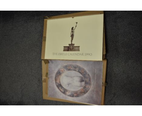 Nine vintage Pirelli calendars, in original boxes.Note - The dates of these calendars are:1987, 1988, 1989, 1990, 1991, 1992,