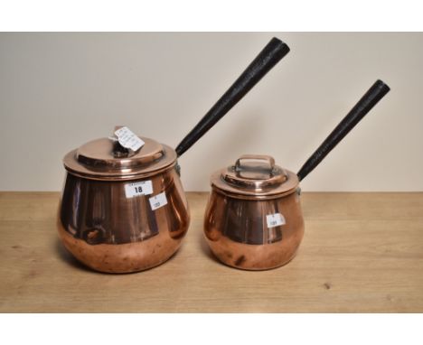 Two mid to late 19th century Benham &amp; Froud (1855-1924) copper pot bellied pans and covers, each with cover and applied h