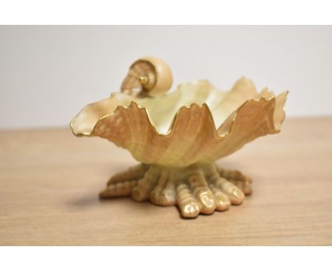 A late Victorian Royal Worcester porcelain blush ivory shell form dish, with gilt embellishments, printed puce factory mark t