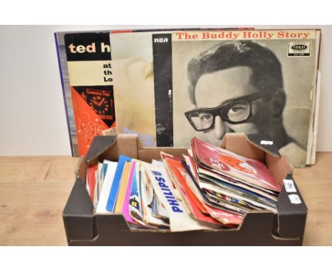 A collection of vintage Lp's and singles including the Buddy Holly story, Elvis and Valdoonican etc.