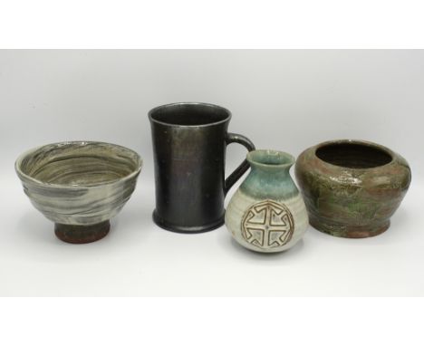  Four pieces of studio pottery, to include a mid-20th century footed bowl by Alex Sharp, marbled grey and white textured body