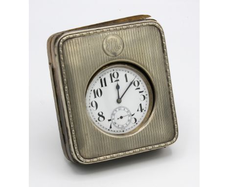  A silver plated goliath pocket watch within a silver case, the watch with white enamel dial with black Roman numerals, subsi