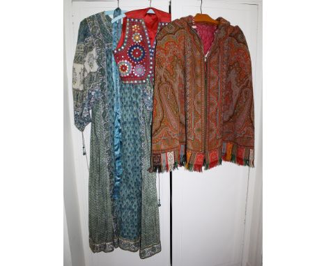  An Anokhi Indian printed cotton dress, 1970s, with drawn string sleeves, size medium; together with an Indian paisley cloak 