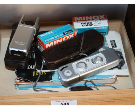  A cased Minox B sub miniature camera & accessories,  with owners manual, book and accessories.