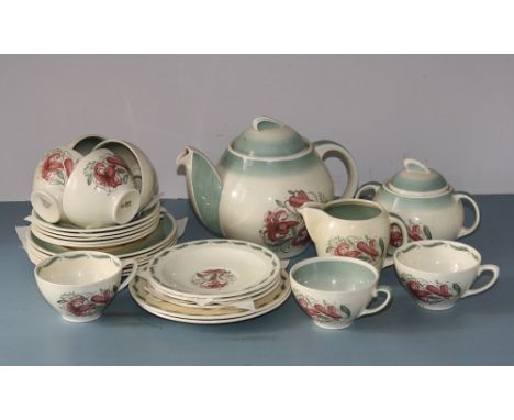 A Susie Cooper 'Kestrel' tea service, Crown Works, Burslem, painted orchid decoration, inc. teapot, sucrier, milk jug, 7 cups