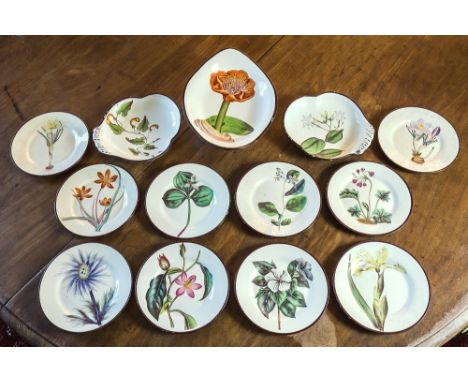 A set of thirteen rare Swansea creamware botanical plates, early 19th century, with brown rims, comprising ten 7½in. circular