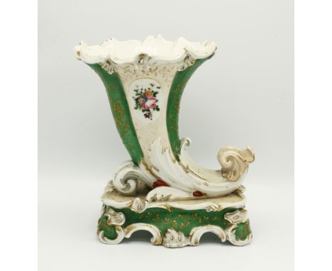  A 19th century English porcelain cornucopia vase, in the manner of Jacob Petit, flared shaped rim, side panels with floral r