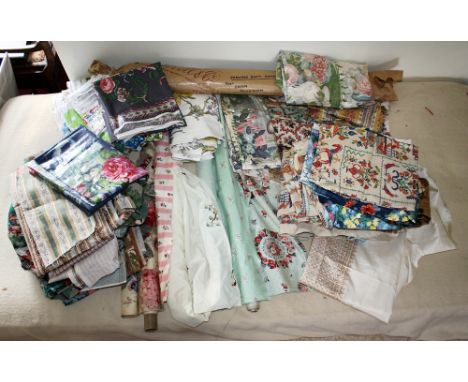  A large collection of vintage fabrics, early to mid-20th century, including a pair of Coronation procession pelmets, chintz,