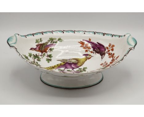 A first period Worcester footed boat shaped dish, early 19th century, decorated with pheasants and other birds on branches an