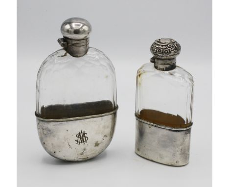 An Edwardian silver cased hip flask, G. H. James & Co. (George Henry James), London 1901, faceted glass body, hinged silver t