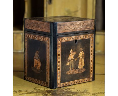  A 19th century fruitwood and marquetry single tea caddy, the hinged lid with inlaid pictorial of three figures dancing a mer