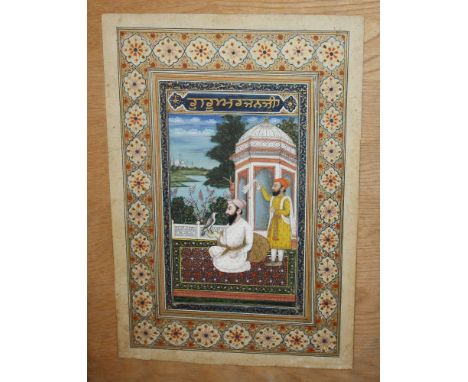 A finely painted Indian watercolour and gouache miniature painting, early 20th century, depicting two gentlemen, one kneeling