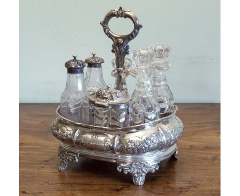  A Victorian silver cruet stand, George Frederick Pinnell, London 1842, of rectangular bombe form, with floral and foliate re