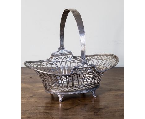  An Edwardian swing handled silver bread basket, William Hutton and Sons Ltd, Sheffield 1907, flared oval form, beaded rim ab