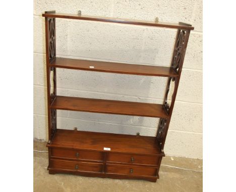 A reproduction wall shelf with four drawers beneath, 70cm wide, 96cm high.