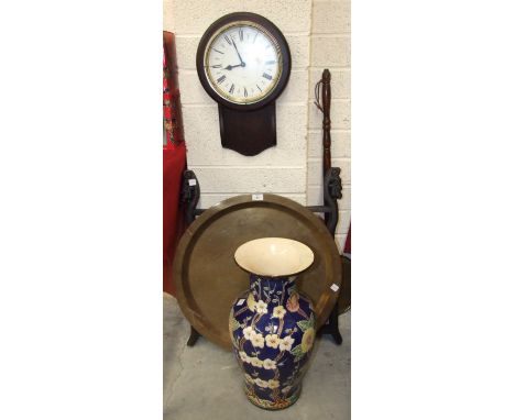 A Chinese circular brass tray on folding hardwood legs, 61cm diameter, 70cm high, a large ceramic vase and other items.