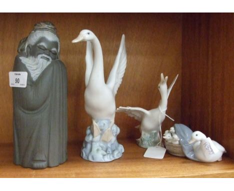 A Lladro figure of a duck and ducklings and three other pieces, (4).