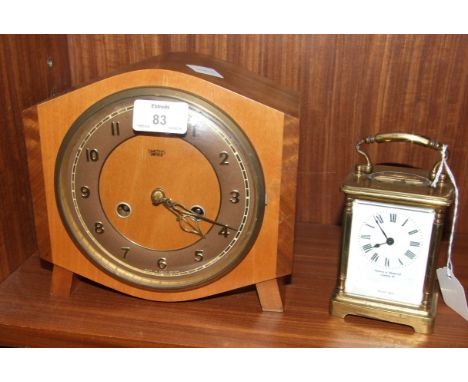A French brass carriage time piece, 15cm high and a mid-20th century Smith's wood-cased mantel clock, (2).