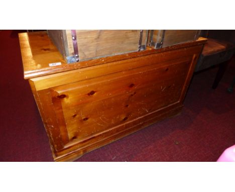 A pine trunk with hinged lid