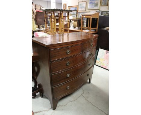 Early 19th century Mahogany Bow Fronted Chest of Two Short over Three Long Drawers, raised on swept bracket feet, 102cms wide