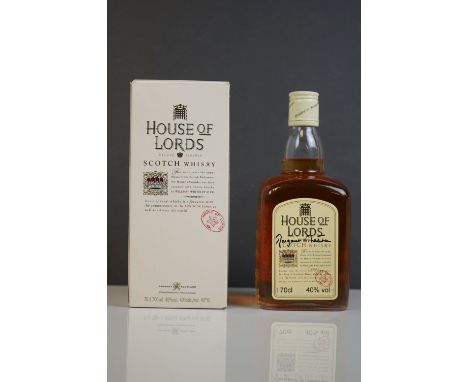 A bottle of House Of Lords scotch whisky signed to the label by Margaret Thatcher. 