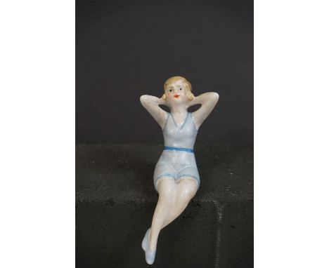 Ceramic art deco style figure of a flapper girl 