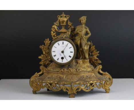 A 19th century French gilt metal clock, white enamel dial marked Hry Marc of Paris. 