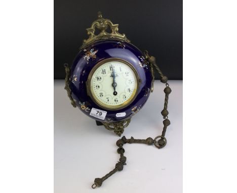 19th century French Gilt Brass Hanging Wall Clock, the cobalt blue porcelain case with gilt and enamel floral decoration, 25c