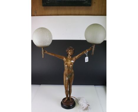 Art Deco Double Branch Cast Metal Table Lamp in the form of a Naked Lady holding a Globular Frosted Glass Shades, 69cms high 