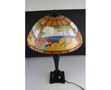 Clarice Cliff printed glass lampshade, in Tiffany style, on twin bulb Corinthian style metal table lamp stand with on/off pul