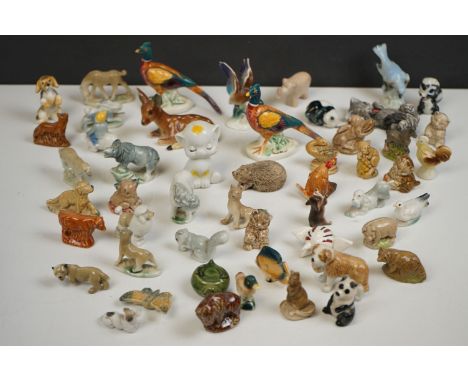 Collection of miniature ceramic animals to include Wade Whimsies etc 