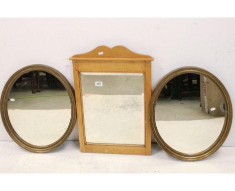 Pair of Gilt Effect Oval Mirrors, 55cms long together with a Pine Framed Mirror and a Table Lamp 