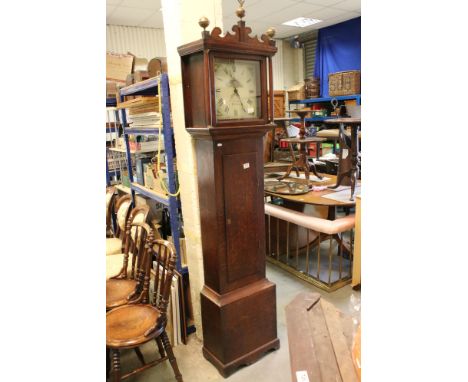 19th century Oak Longcase Clock, the square hood with brass finials holding a dial with painted face, having Roman numerals a