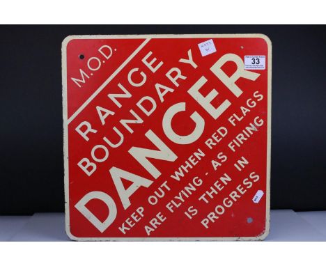 A mid 20th century enamel metal MOD sign for a firing range Keep Out When Red Flags Are Flying. 