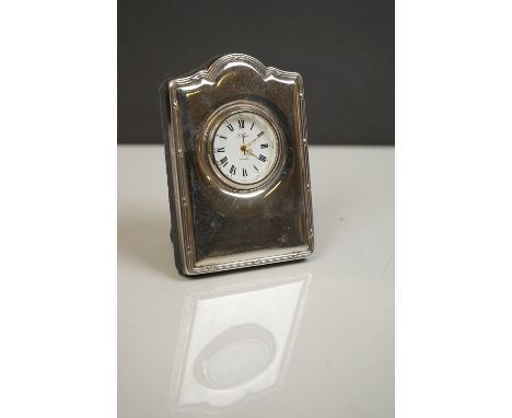 A fully hallmarked sterling silver mounted clock, maker marked for Carr's of Sheffield. 