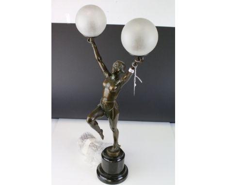 Art Deco Double Branch Cast Metal Table Lamp in the form of a Naked Lady holding to Globular Frosted Glass Shades, raised on 