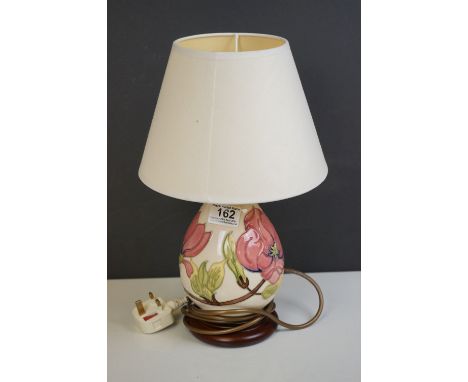 Moorcroft Tube Lined Table Lamp in the Magnolia Patterm, with silk shade, lamp 23cms high 