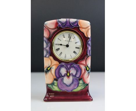 Moorcroft Tube Lined Clock with Pansy pattern, impressed Blue marks to base and initialed WM, 16cms high 