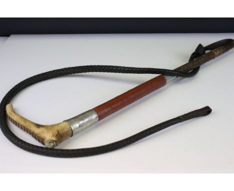 Early 20th century Huntsman's Whip, the Antler Handle with Makers Button, Leather Covered Grip and Leather Plaited Lash 