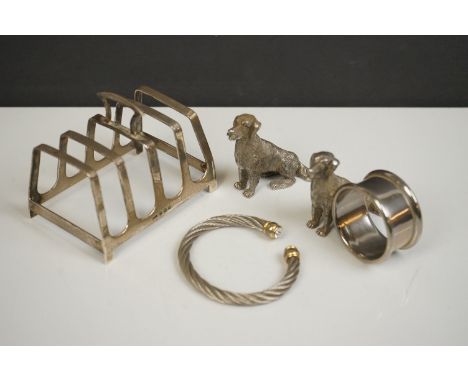 A fully hallmarked sterling silver toast rack together with a silver plated dog napkin ring, dog figure &amp; bracelet (4) 