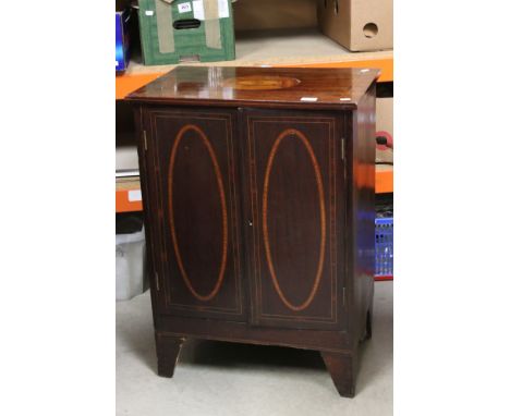 Edwardian Inlaid Mahogany Cabinet, the two panel doors opening to a shelf, raised on bracket feet, 61cms wide x 84cms high 