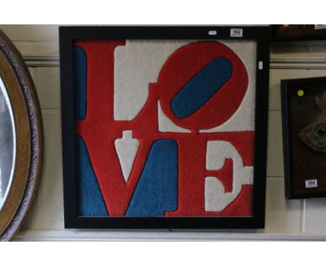 A framed carpet woollen panel Love 59 cm square. 