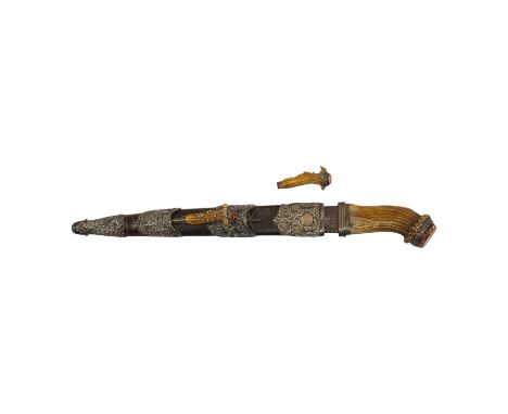 A Scottish Highland dirk, c.1900, regulation blade, staghorn handle with white metal mounts and foiled glass pommel stone, le