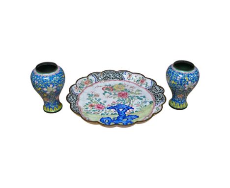 A pair of Chinese Guangzhou enamel vases, 19th century and an 18th century Guangzhou enamel dish, largest 26cm in diameter (3