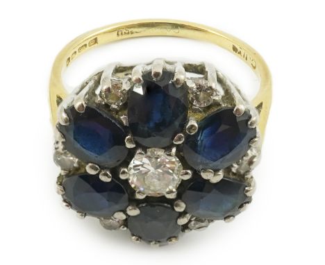 A 1970's 18ct gold, sapphire and diamond set circular cluster ring, size K/L, gross weight 5.1 grams. Condition - fair