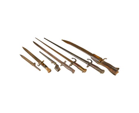 Seven bayonets; a speculative 20th century English bayonet of unknown type with broad arrow and other English type markings, 