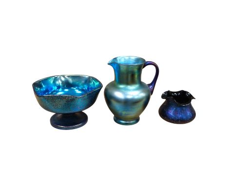 A Loetz cobalt Papillon iridescent glass footed hexagonal bowl, a Kralik blue iridescent vase and a large Bohemian iridescent
