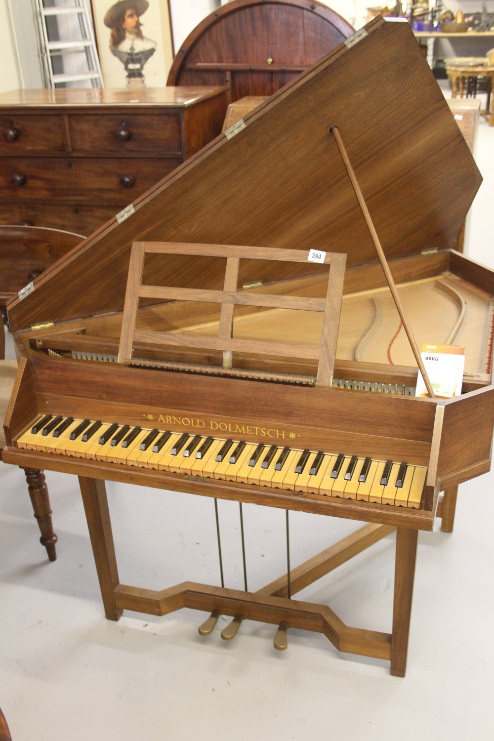 20th cent. Walnut cased Harpsichord by Arnold Dolmetsch No 758, 3 pedals.